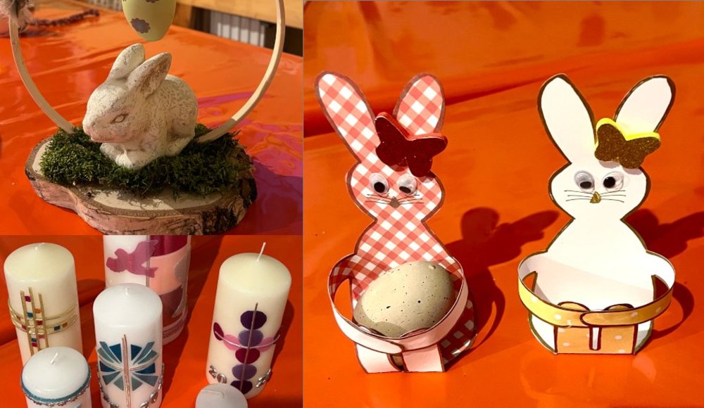 Häschen aus Papier in rot weiß kariert und weiß, Kerzen und Holzgesteck mit Häschen