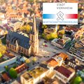 Stadt Viernheim Wirtschaftsförderung Stadt Viernheim von oben mit Logo der Wirtschaftsförderung